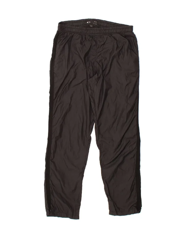 OAKLEY Womens Tracksuit Trousers UK 14 Large Black Polyester Trousers versatile all-occasion