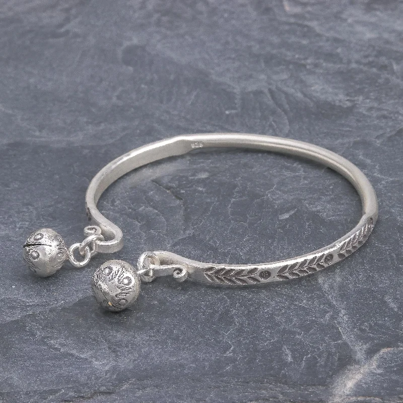 Must-Have Jewelry Pieces At Reduced Prices Song of the Forest Silver Cuff Bracelet with Thai Karen Hill Tribe Bells